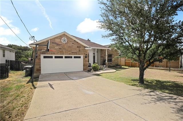 10208 Twin Lake Loop is a 3/2/2 + study ranchette on a generous lot with a wet weather creek at the rear of the property.