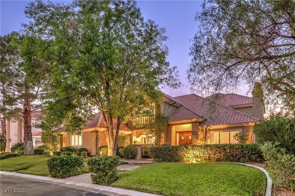 Mediterranean / spanish house featuring a tile roo