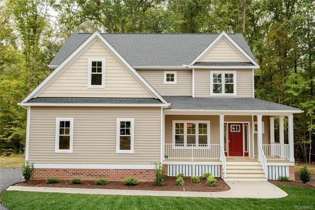 Front of Home has Full Front Porch w/Aluminum Rail