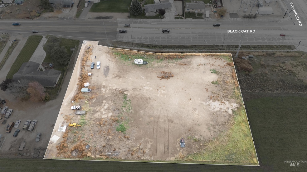 Aerial view of property and surrounding area