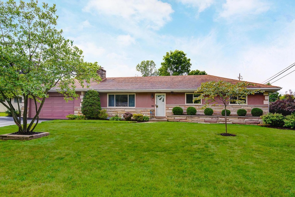 Welcome home to 521 Village Dr!