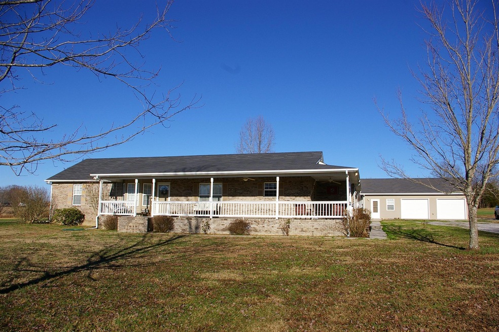 Front view of home with wrap around porch
