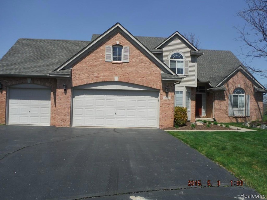 Large garage. Inviting entry.