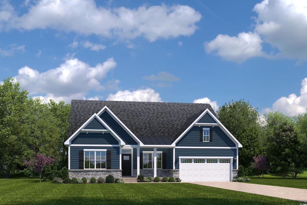Craftsman-style house with a front yard, a garage,