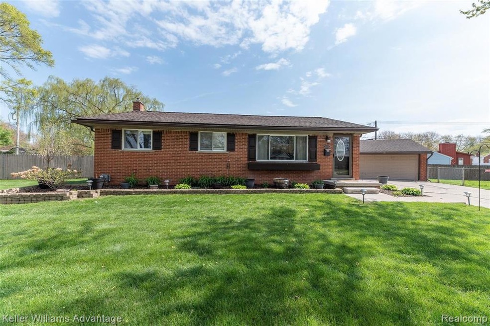 Front Elevation - great curb appeal and perennial flower beds