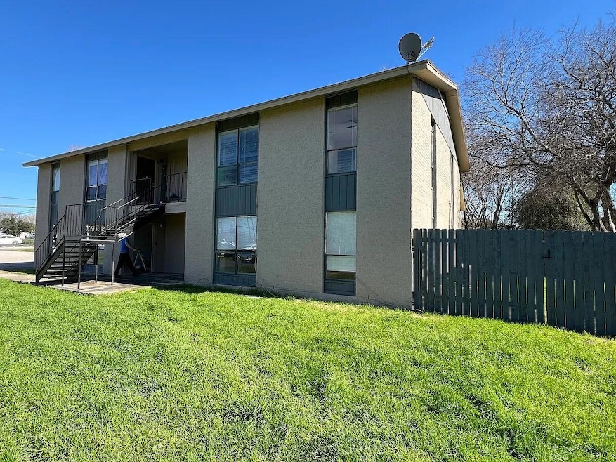 View of property with stairway