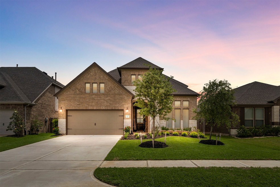 Welcome home to 2115 Blossomcrown Dr in the Master Planned Community of Firethorne