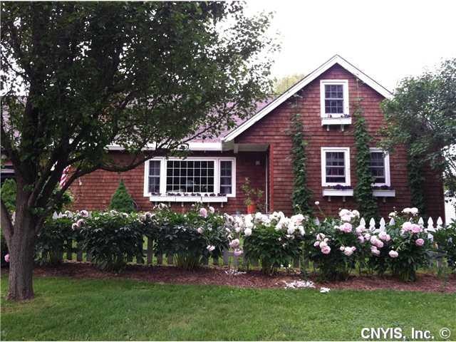 Exterior Front Look at those peonies!