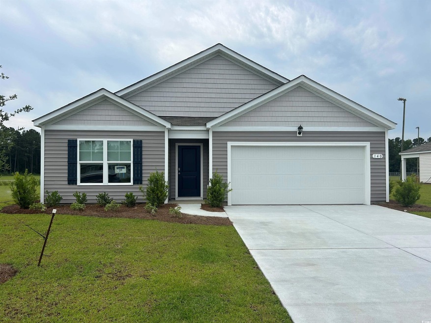 View of front of house featuring a front yard and 