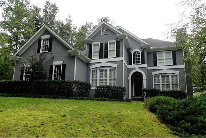 Exterior Front. Warranted Hardcoat Stucco