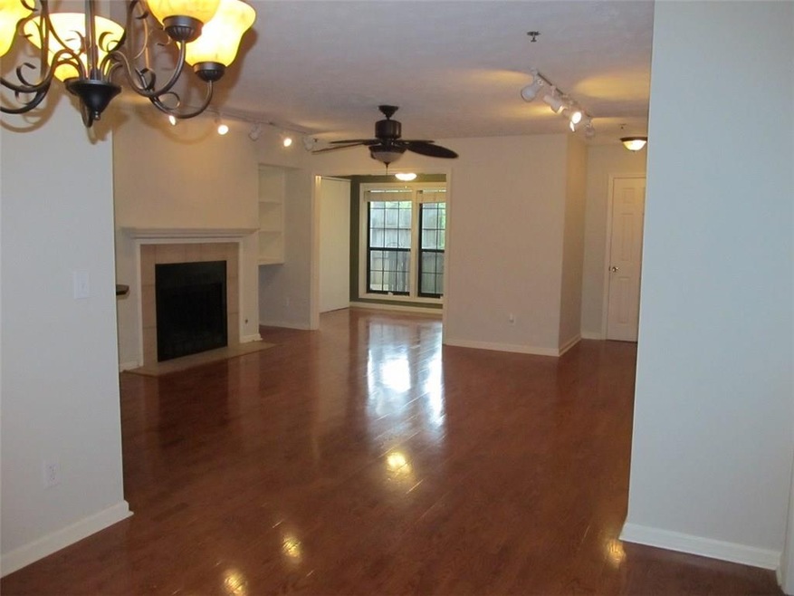 View from dining room out to living room and sunro