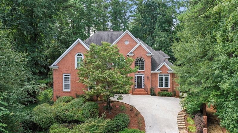 GORGEOUS CUL-DE-SAC HOME FEATURES 3 SIDED BRICK
