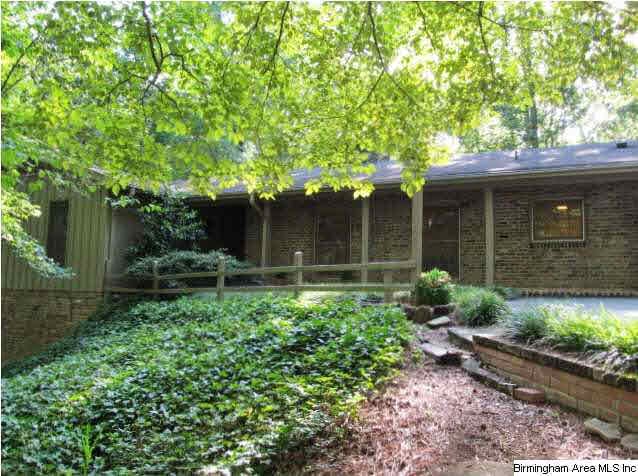 Custom one owner home nestled among the trees in o