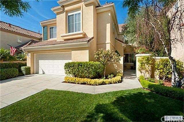 21 Dorian has a long driveway and gated entrance.