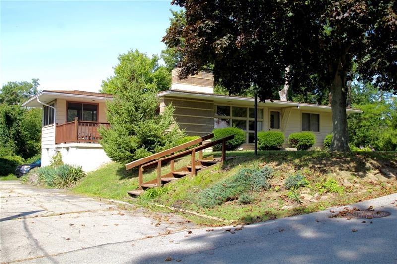Mid century curb appeal with striped brick accents