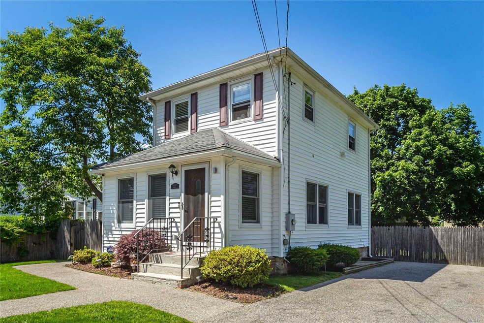 133 43rd St, Copiague, NY 11726 - photo 1