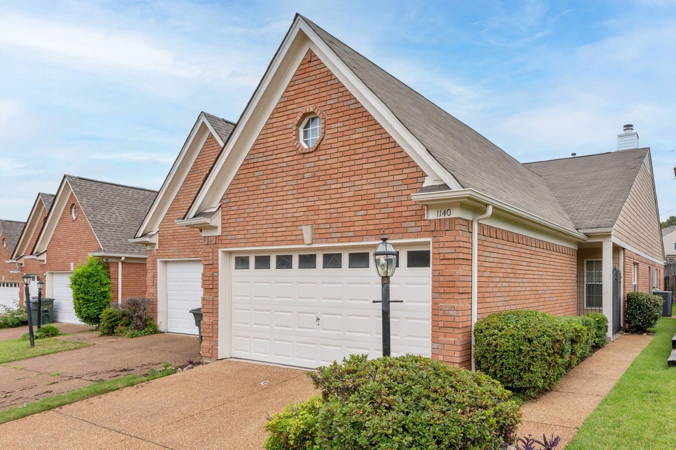 View of front of house with garage.