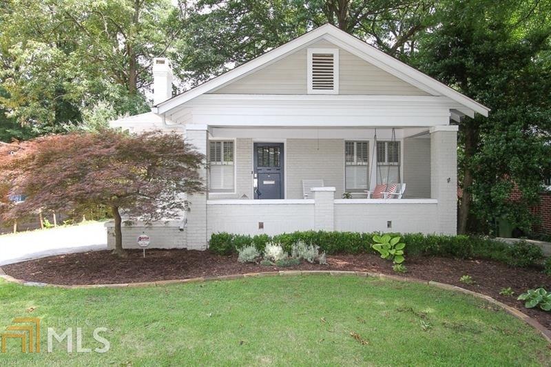 Built c. 1928, this renovated brick bungalow offer