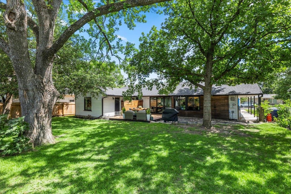 Back of property with an outdoor living space and