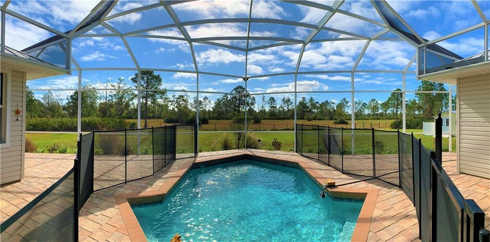 Caged Pool Overlooking Open Space