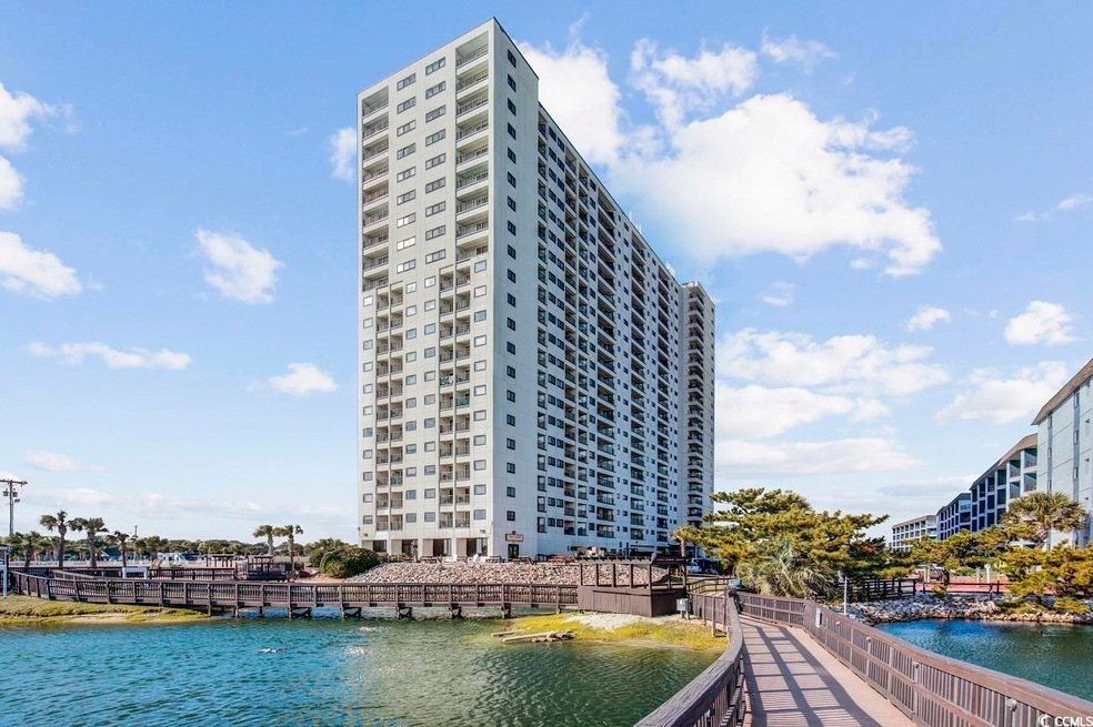 View of property featuring a water view