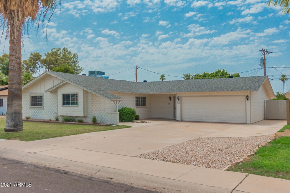1. FRONT ELEVATION WITH HOME THAT HAS TR