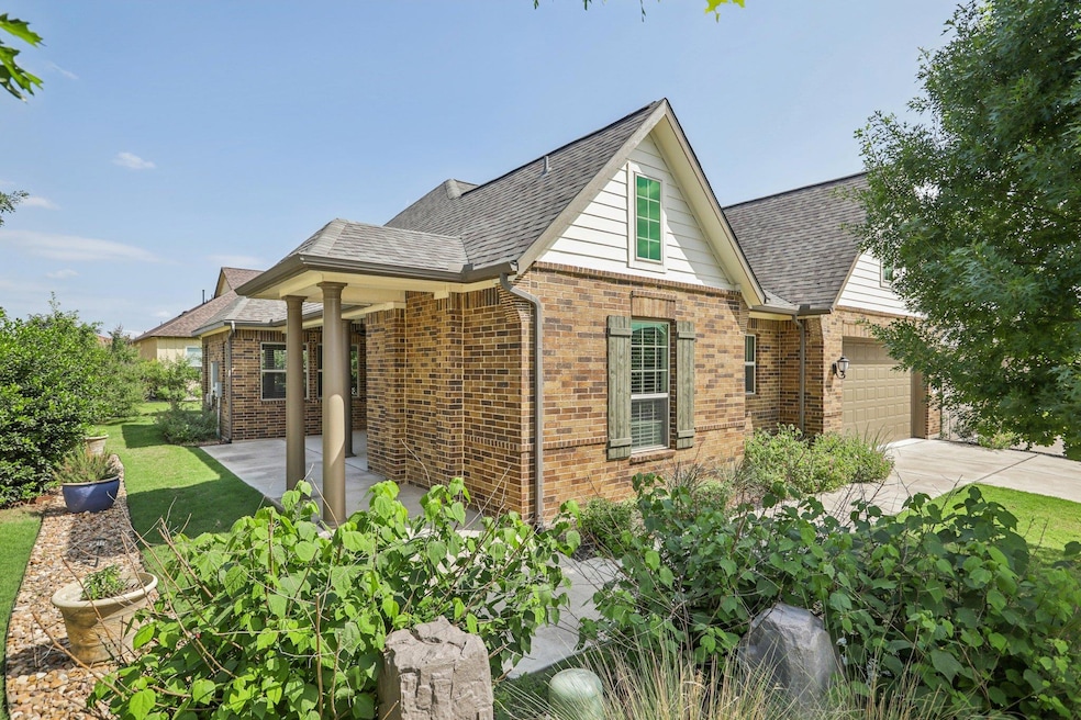 View of home's exterior featuring brick siding, c