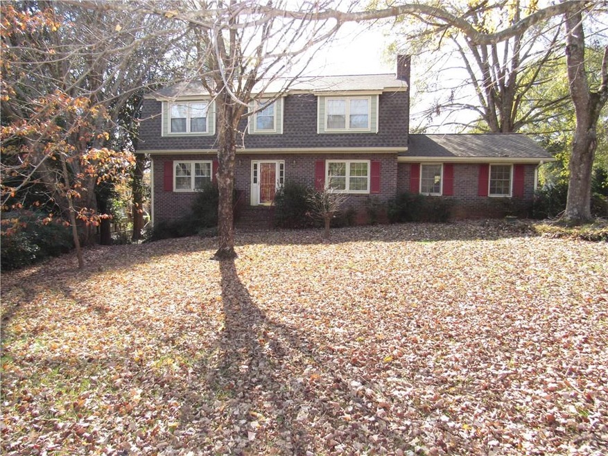 Gorgeous exterior with a spacious front yard in a 