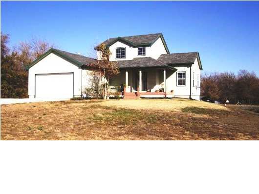 Front of beautiful 2 story home on 4 1/2 acres