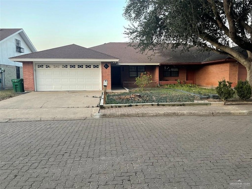 Ranch-style house featuring a garage