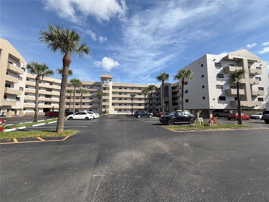 15969 NW 64th Ave unit 504, Miami Lakes, FL 33014 - photo 1