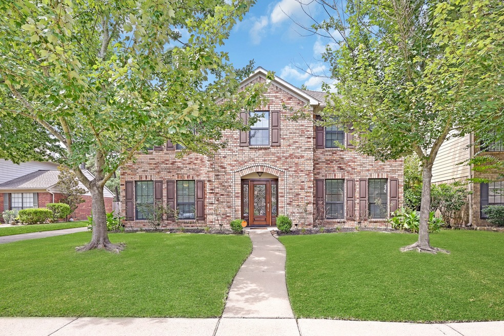 7634 Clover Canyon Cir, Houston, TX 77095 - photo 1