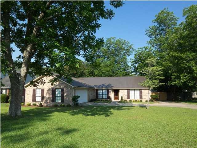 Gorgeous Brick Home on beautiful lot with low main