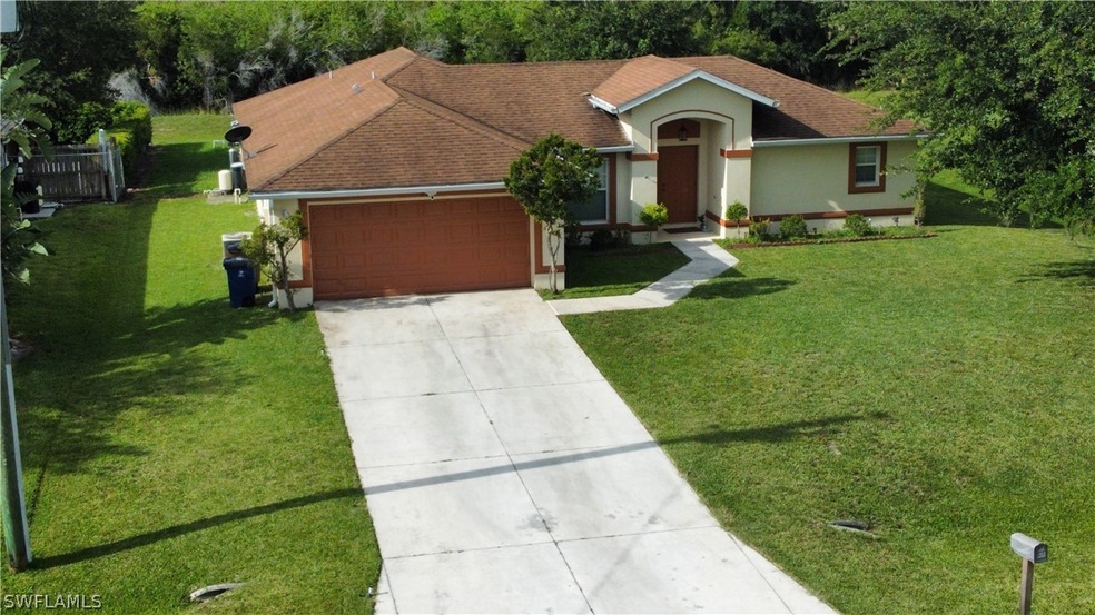 153 Ocean Park Dr, Lehigh Acres, FL 33972 - photo 1