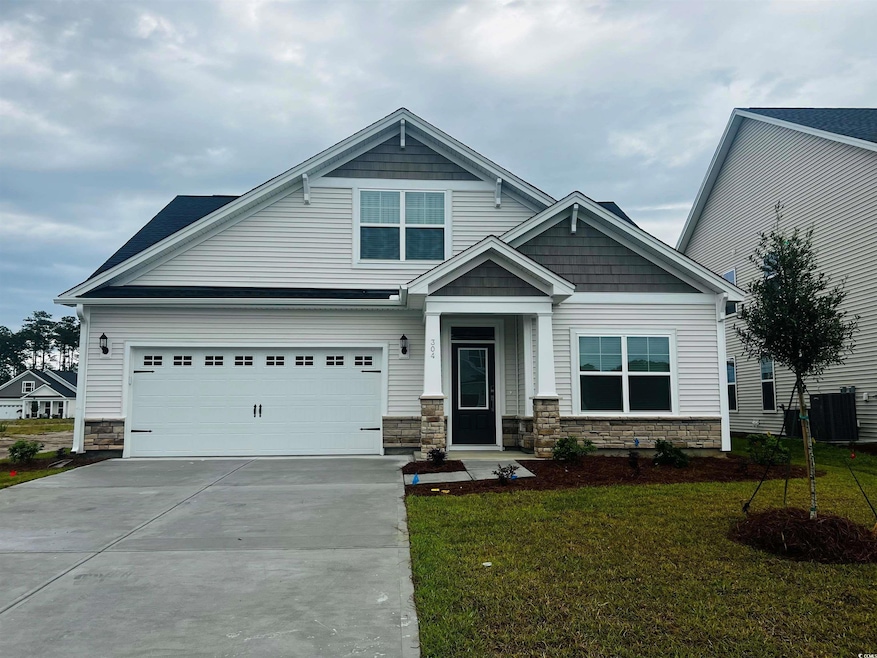 Craftsman house featuring a front yard, cooling un