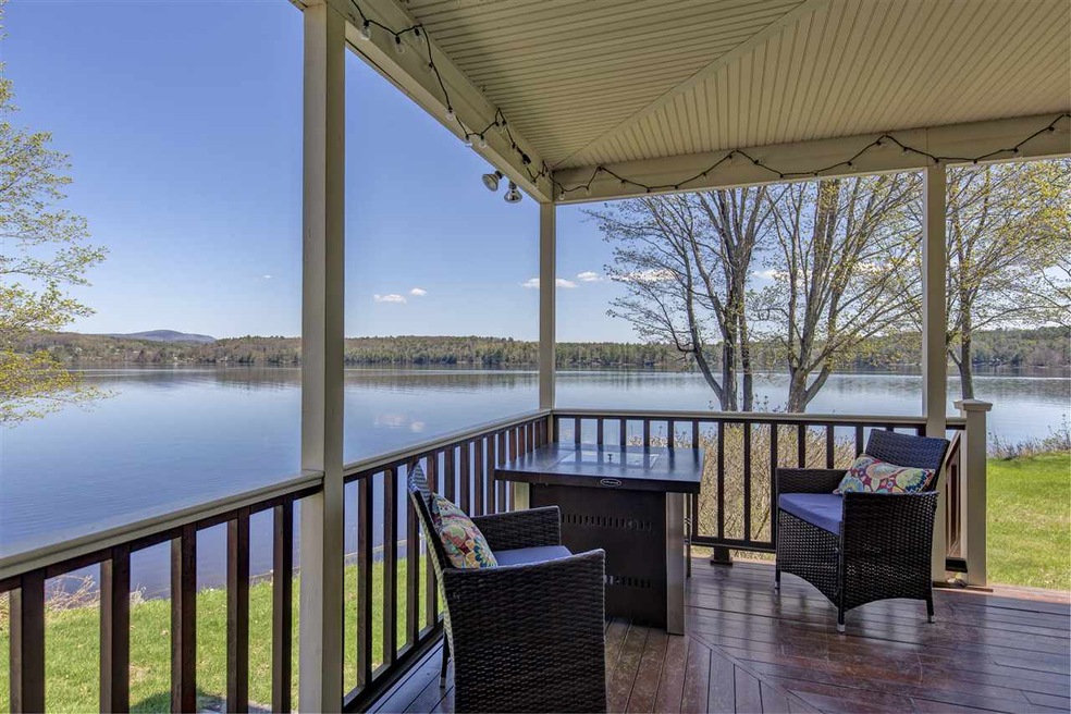 Enjoy life on Mascoma lake on your wraparound porc