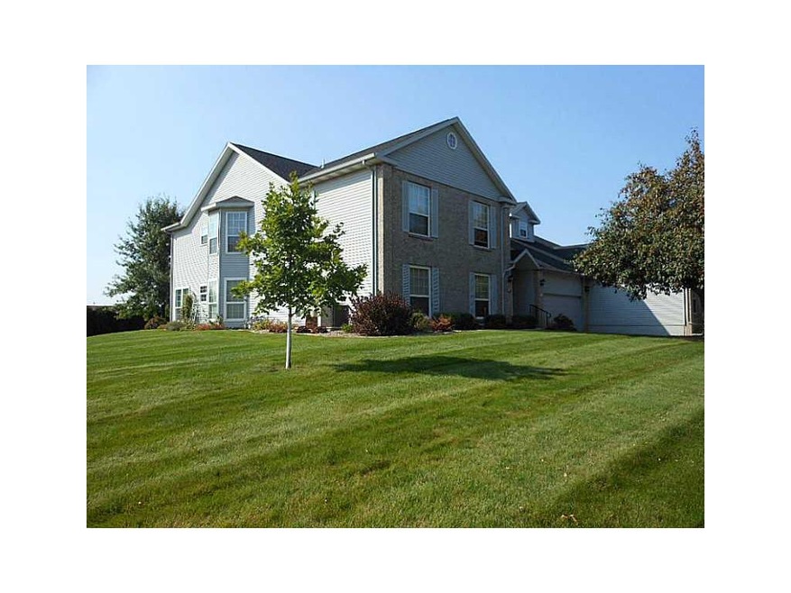 Front Exterior. Large lawn makes this building  fe