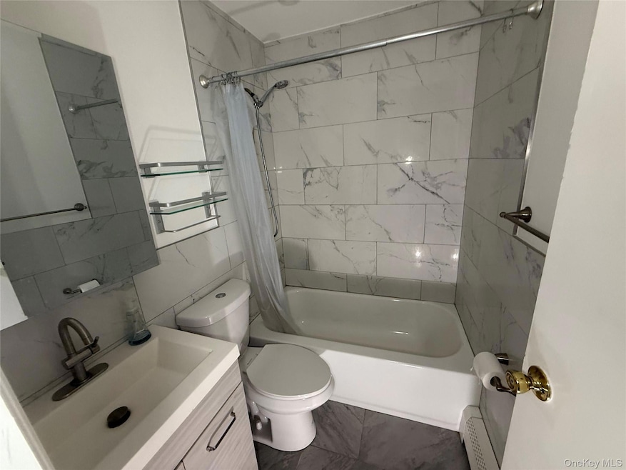 1219 2nd Ave unit 103, New Hyde Park, NY 11040 - photo 1