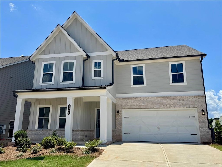 Gorgeous home with charming front porch!