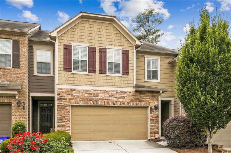 Spacious 3BR / 2.5 Bath Townhome with bonus office / play area in fun, gated community!