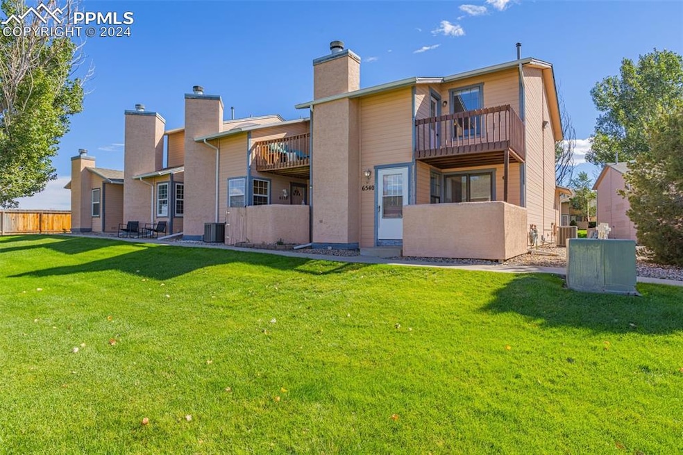 Front of property with a balcony, and upper deck