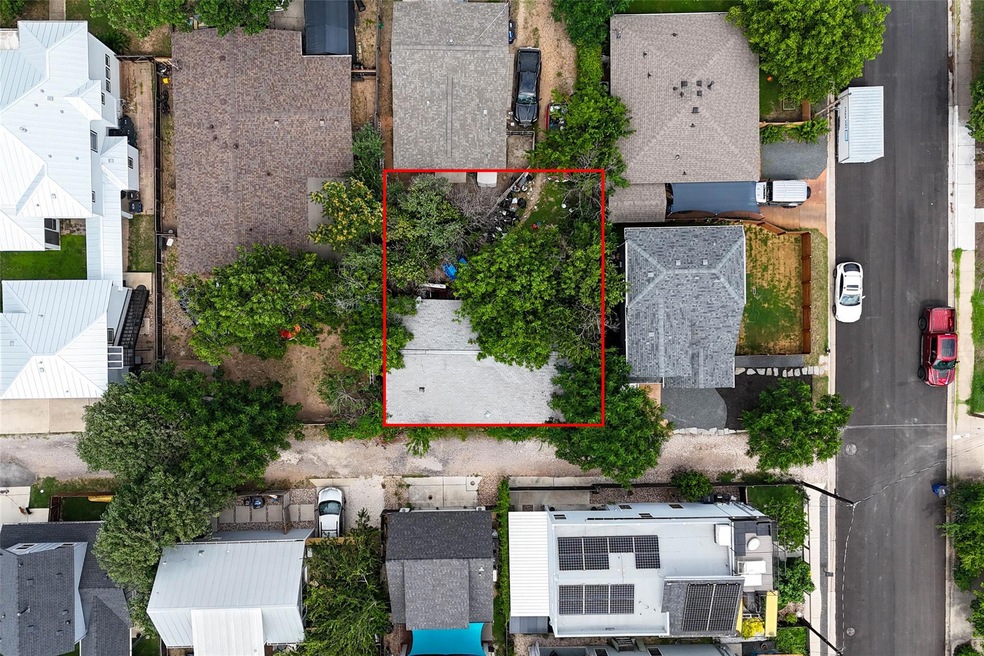 Aerial perspective of suburban area with property
