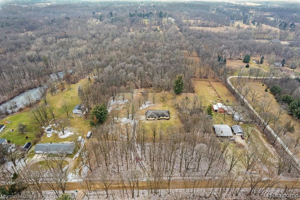 All brick ranch sited on 10 majestic acres