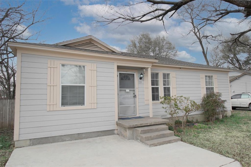 FRONT VIEW OF HOME FROM DRIVEWAY