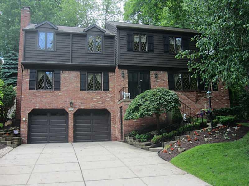 Exterior Front. Spacious, handsome custom-built br