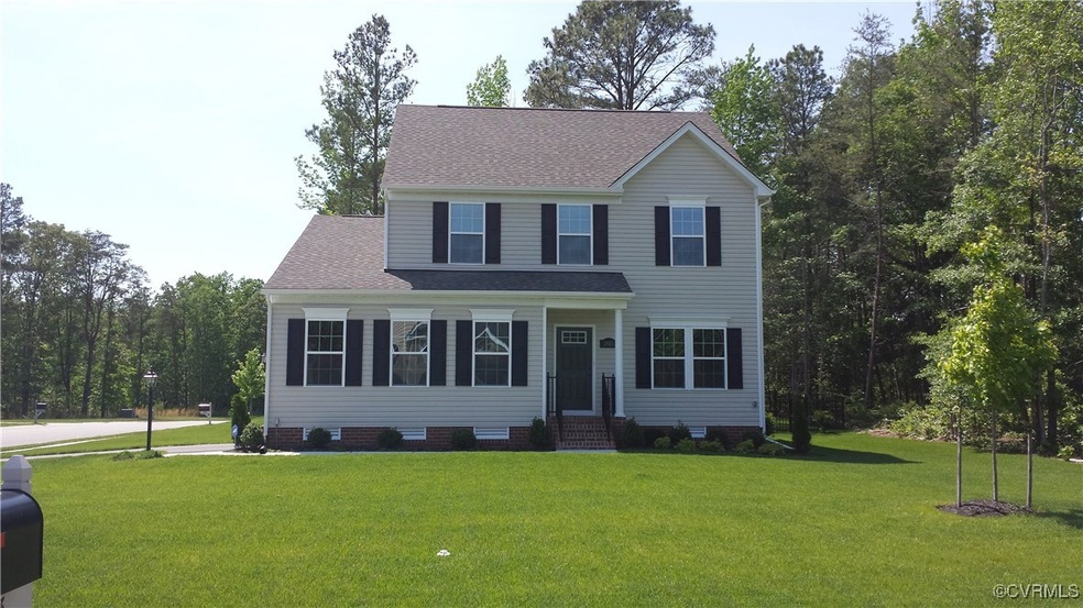 View of front of property featuring entry steps, a front lawn, crawl space, and a shingled roof