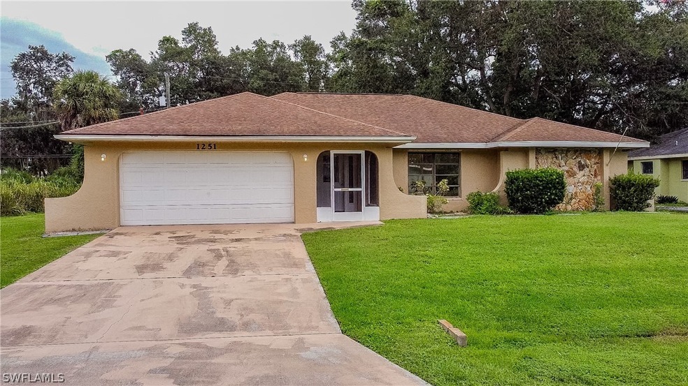 1251 Roswell Dr NW, Port Charlotte, FL 33948 - photo 1