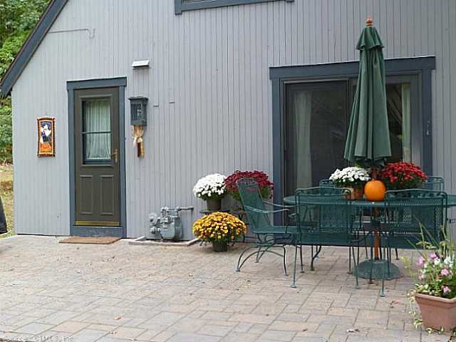 Exterior Front. New stone patio