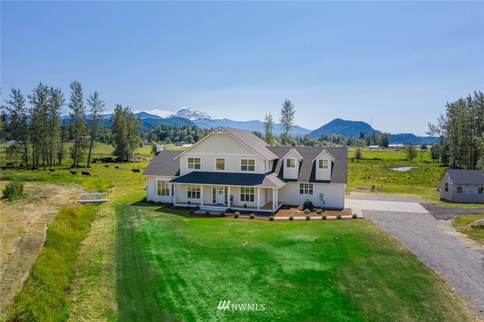 Stunning front view of home on 13.28 with amazing Mt Rainier views from most rooms in the home