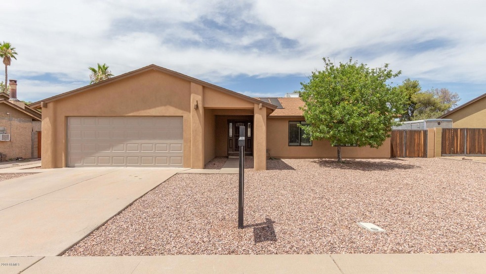 Fresh stucco and a brand new garage door